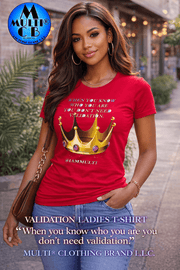 Validation - Ladies Boyfriend 100% combed ring-spun cotton T-Shirt in red with gold crown graphic and quote, worn by woman outdoors. Ideal for casual wear in Apparel & Accessories > Clothing > Shirts & Tops.
